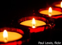 lit candles; Learn more about the PDA response to Public Violence
