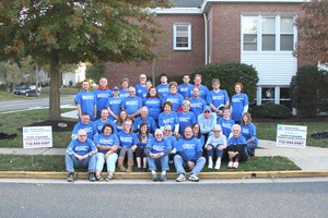 volunteer team wearing blue shirts