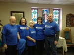 Volunteers wearing blue tshirts