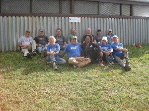 volunteers sitting on the grass